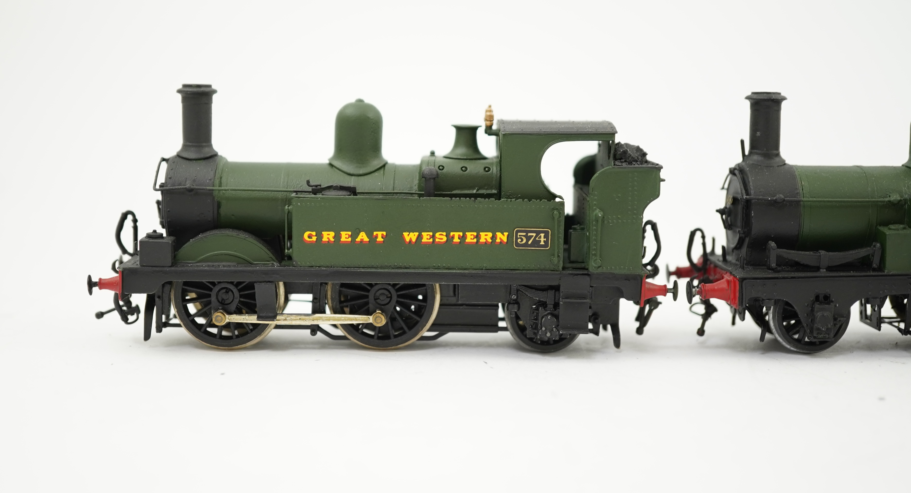 Four 00 gauge kit built GWR tank locomotives, three brass and white metal; a 14xx class 2-4-0T, 1458, together with an 517 class 0-4-2T, 574, and a 633 class 0-4-2T, 633, plus a plastic/resin and metal 46xx class 4-4-2T,